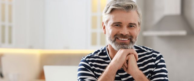 middle aged man smiling